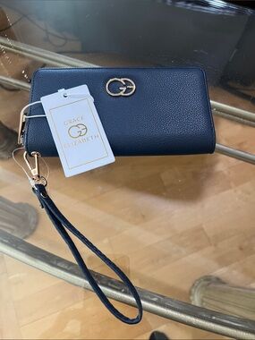 Navy Wristlet Clutch with Gold Emblem